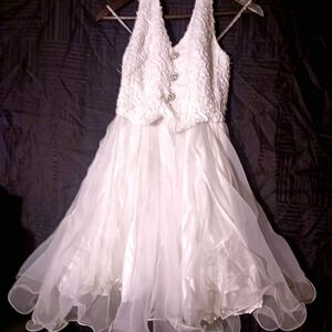 Elegant White Sleeveless Dress with Silver Buttons